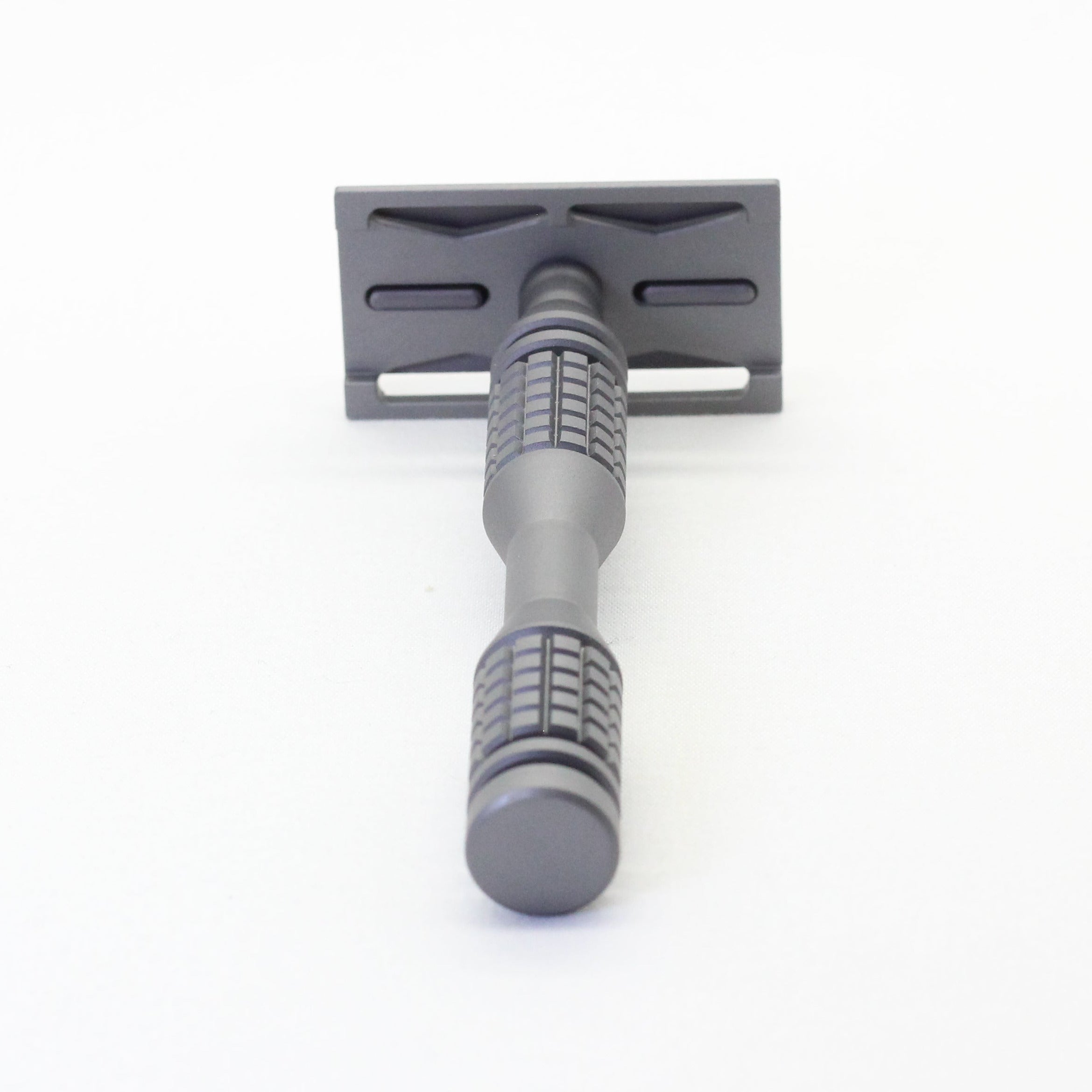 Gray safety razor on a white background