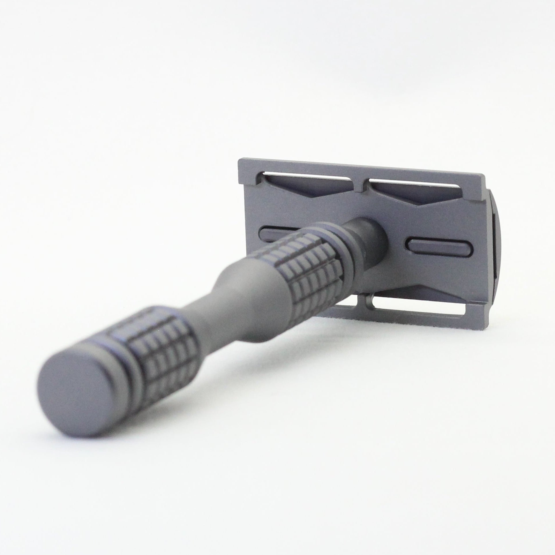 Gray safety razor on a white background - Starter safety razor