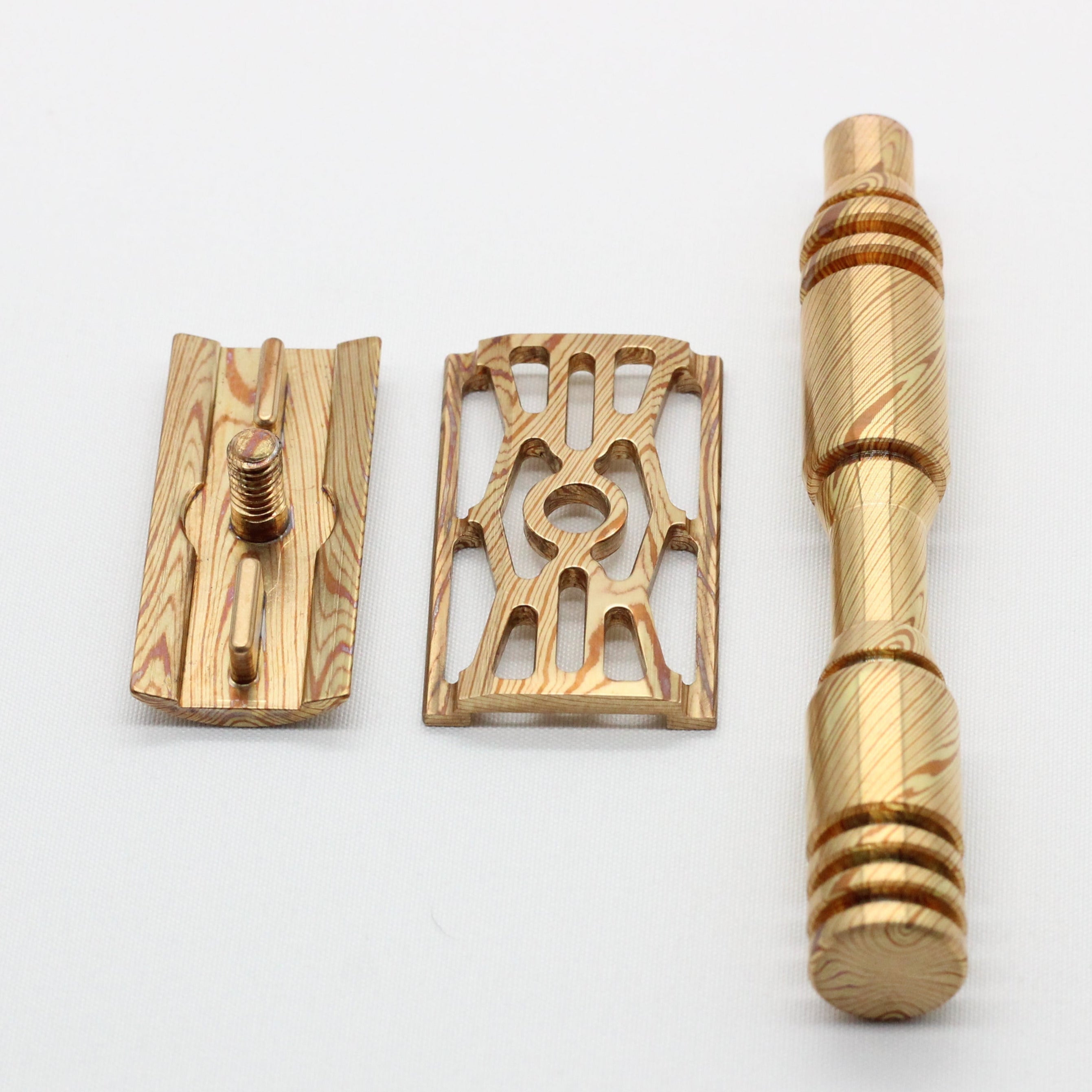 Underview of Custom high end Mokume Gane copper and brass single edge razor a double edge safety razor for wet shaving polished and heat patina on mokume gane
