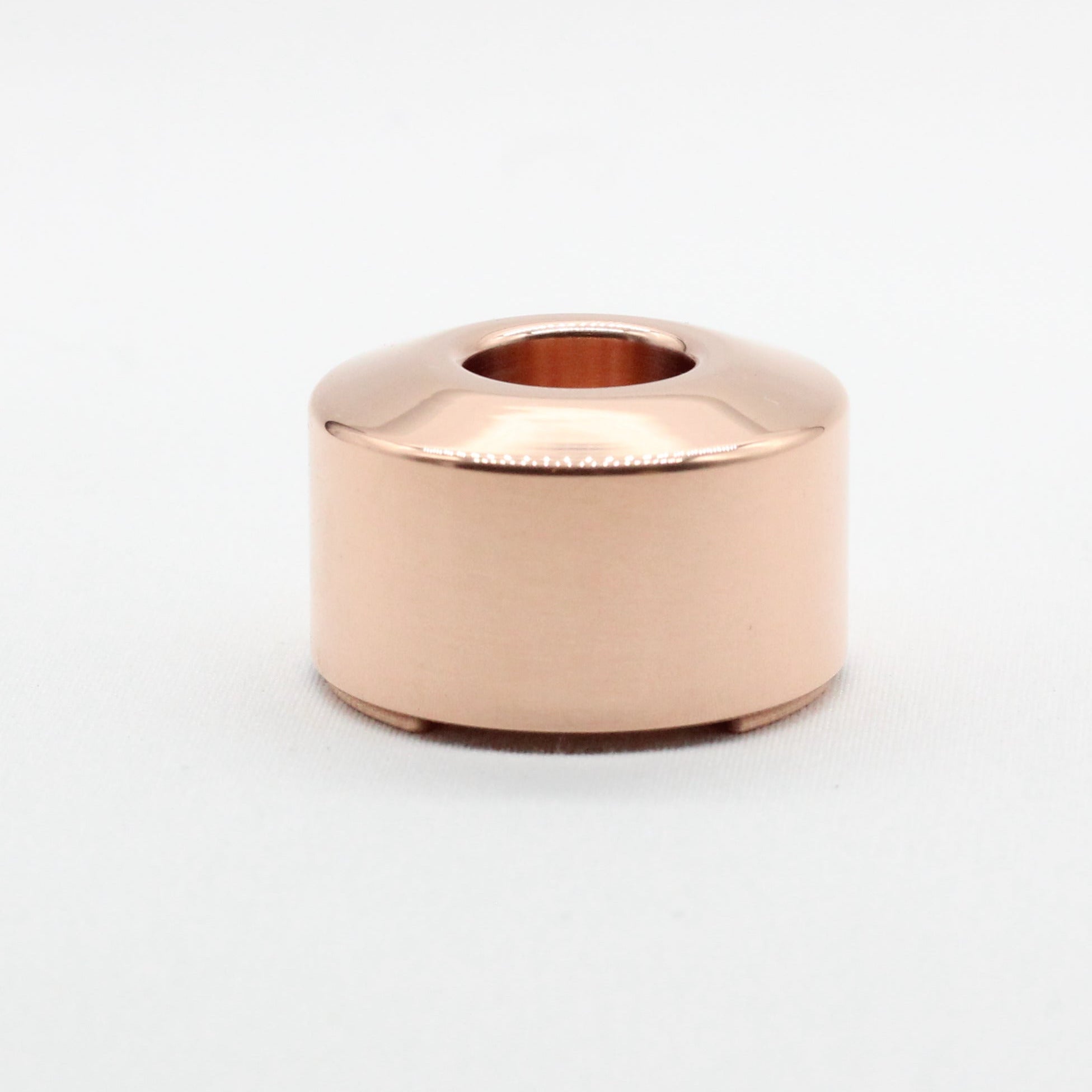 Side view - Copper safety razor stand - c110 99.9% pure copper - Tripod feet to allow water and air to flow - polished finish - works with all carbon shaving co single edge safety shavers