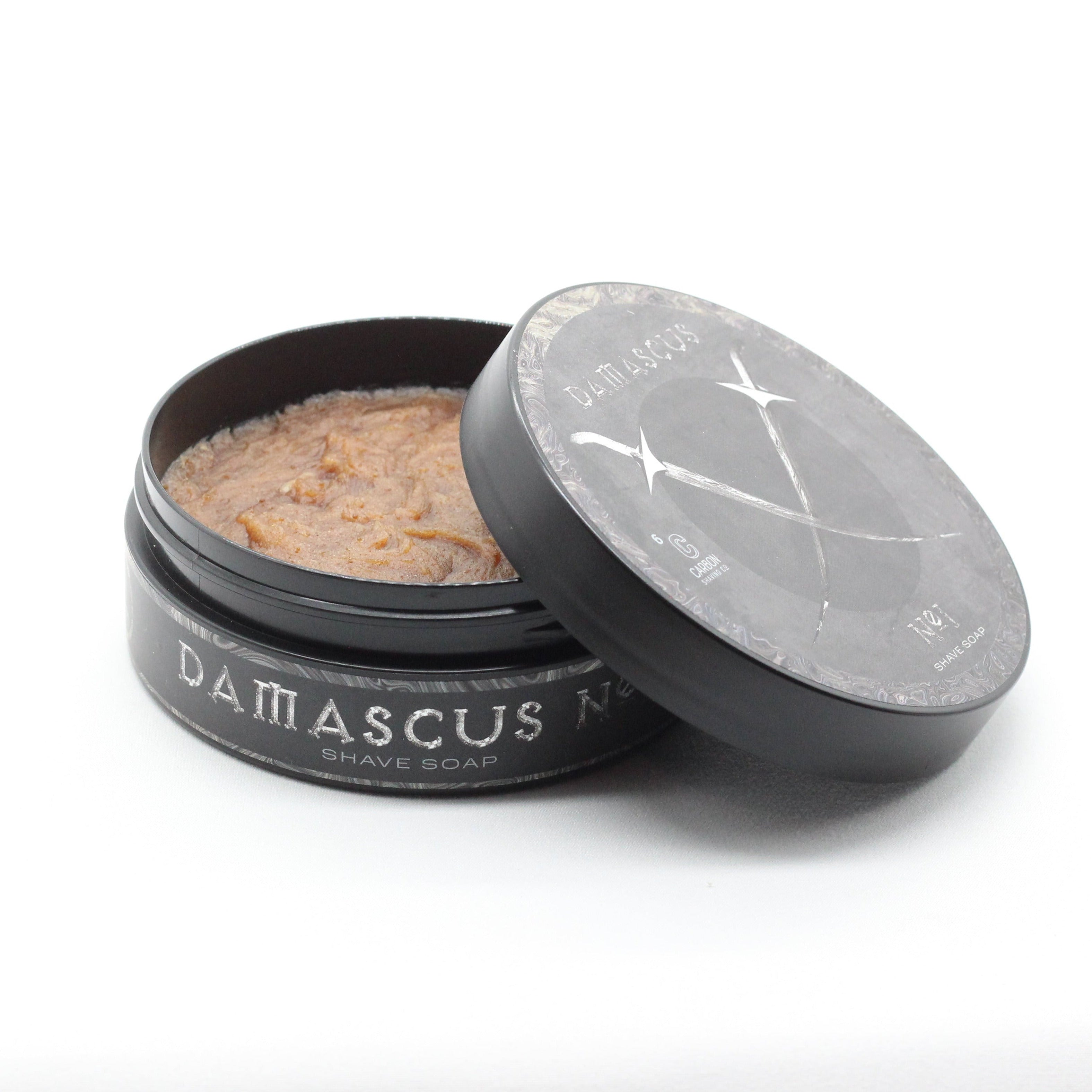 Open container of Damascus No. 3 Shave Soap with visible brand name on a white background
