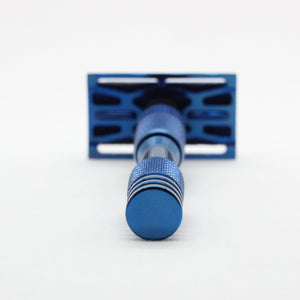 Blue safety razor on a white background