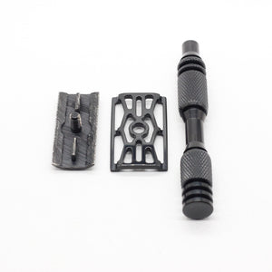 Three black metal components on a white background