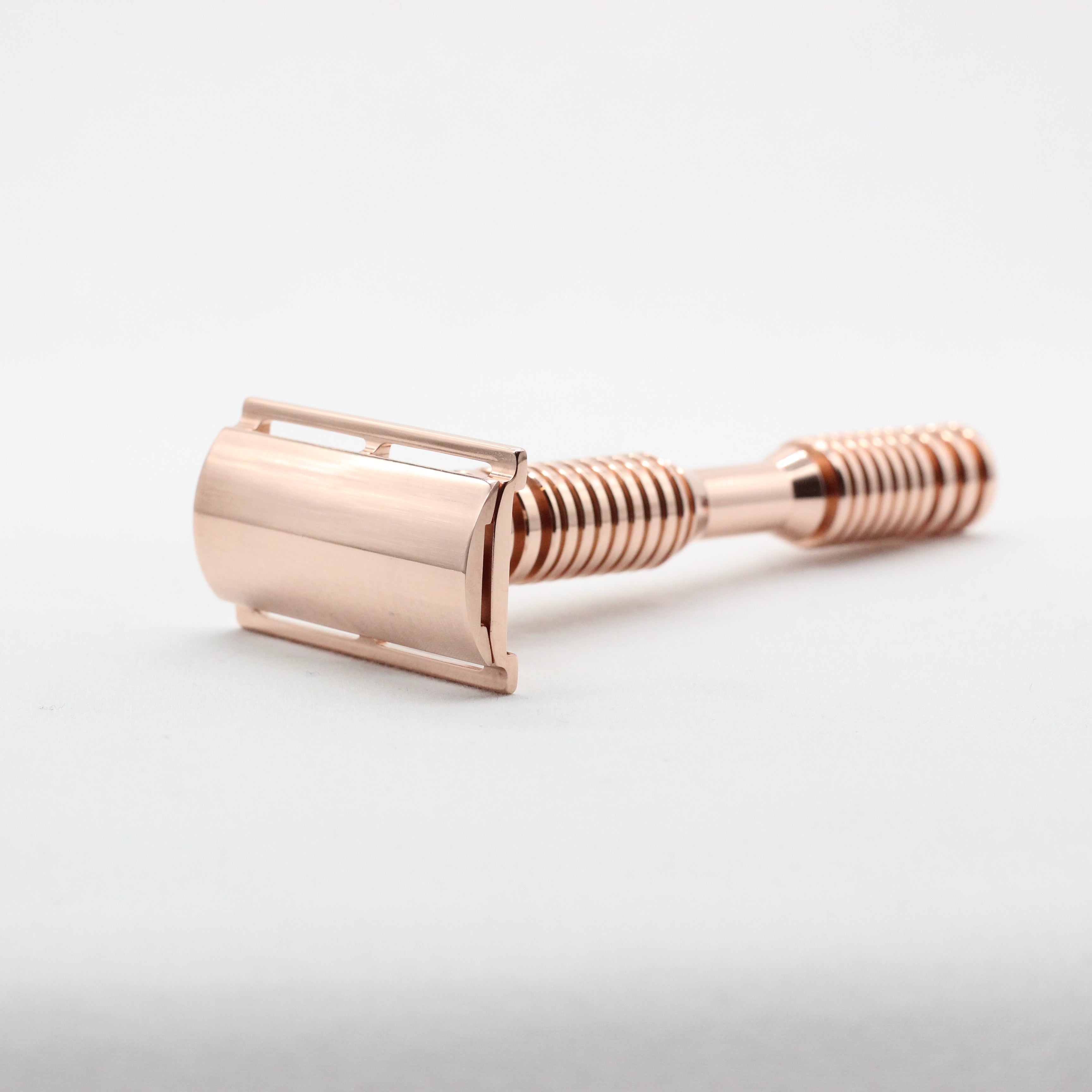 Polished high end copper DE shaver to reduce ingrwn hairs on men - side view
