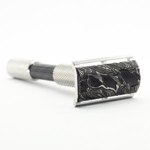 Vintage-style safety razor on a white background