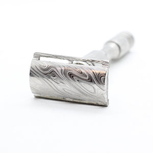 Side view - Stainless steel Damascus with twist pattern single edge razor a double edge safety razor for wet shaving polished grade 304 and 316 - custom forged in the USA - luxury high end safety razor to reduce ingrown hairs and irritation - for a smooth shave