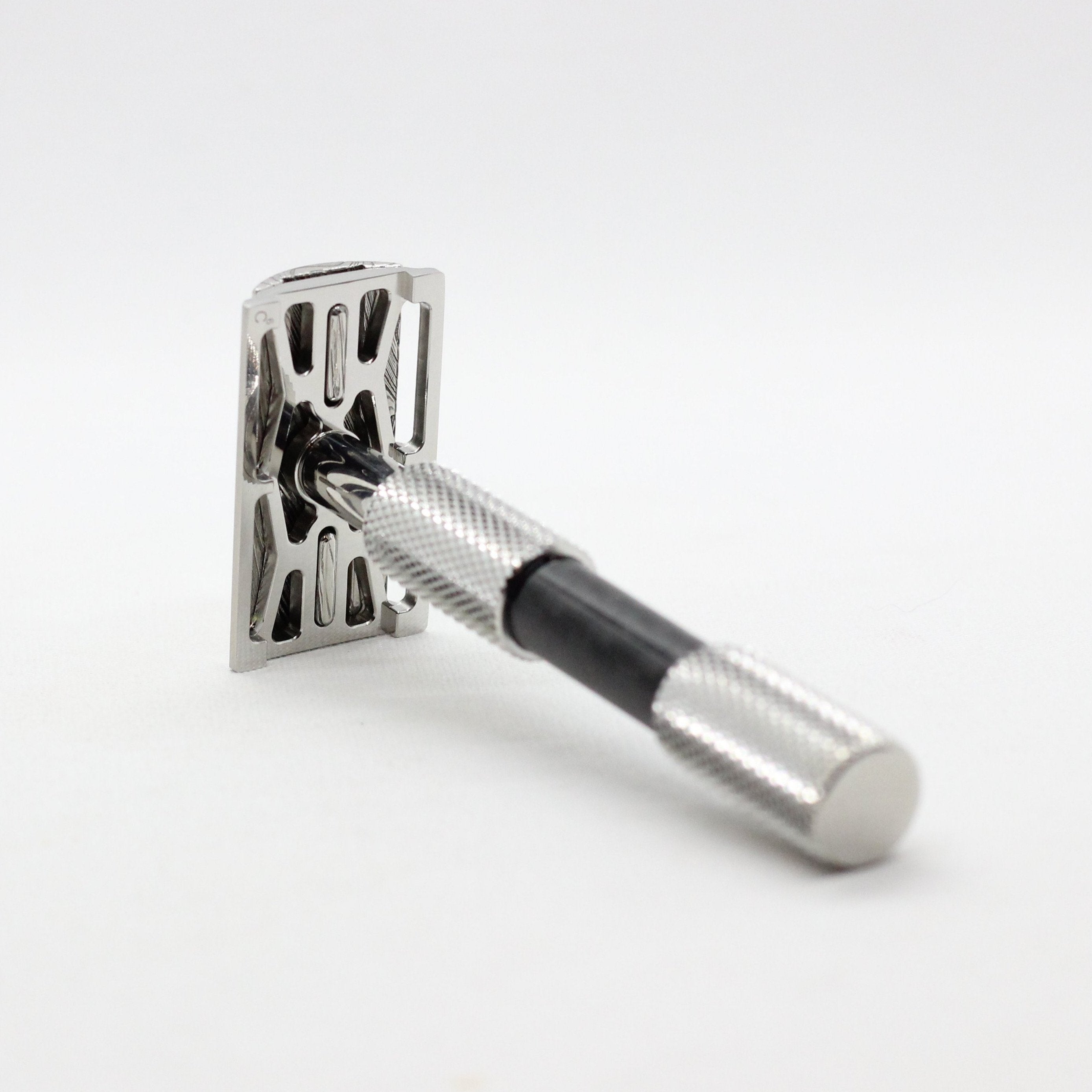 Cx-Avem - Damascus, 316L Stainless steel and Carbon Fiber.