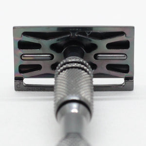 Close up of web plate with DLC or Diamond Like Carbon coating TAC coated carbon coating safety razor with pinch design shaver holds blade rigid - Polished Titanium single edge razor / double edge safety razor shaving - web plate / wet shaving