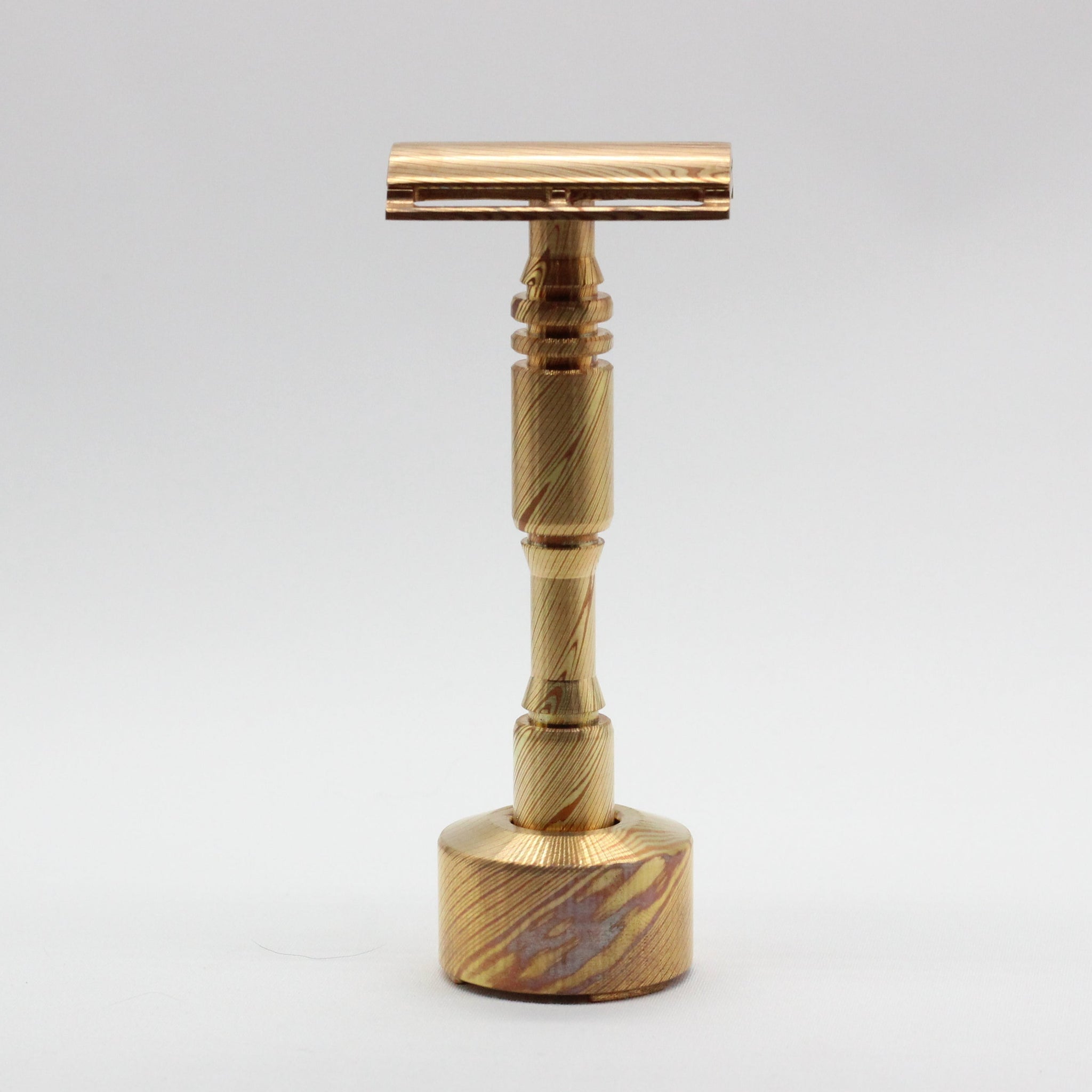 Cx-Mokume in stand - Custom high end Mokume Gane copper and brass single edge razor a double edge safety razor for wet shaving polished and heat patina 