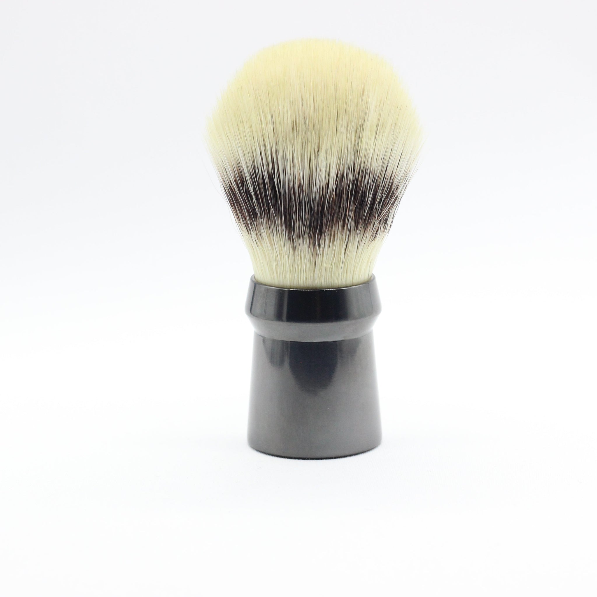 Side view ergonomic Titanium DLC coated shaving Brush - Hand Tied shaving knot - synthetic , not badger hair or horse hair . Cruelty free - Hand tied in Germany